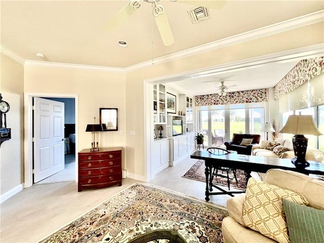 carpeted living room featuring crown molding and ceiling fan