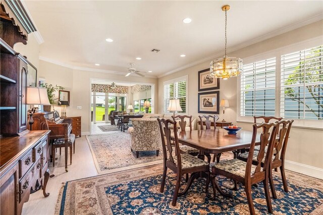 1135 Saint Georges Ln, Vero Beach, FL 32967 - dining space with a chandelier, light wood-style flooring, ornamental molding, recessed lighting, and ceiling fan