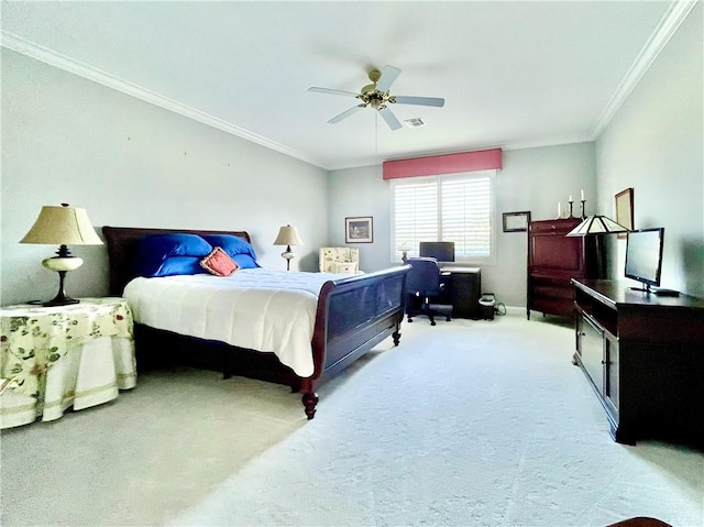 carpeted bedroom with ornamental molding and ceiling fan