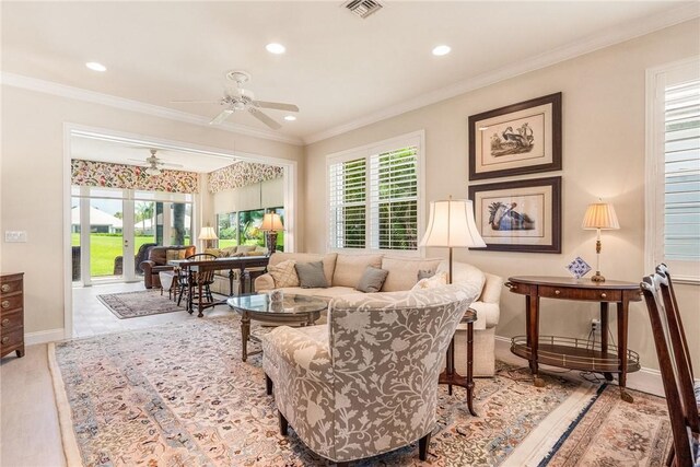 1135 Saint Georges Ln, Vero Beach, FL 32967 - living room featuring ceiling fan, crown molding, and recessed lighting