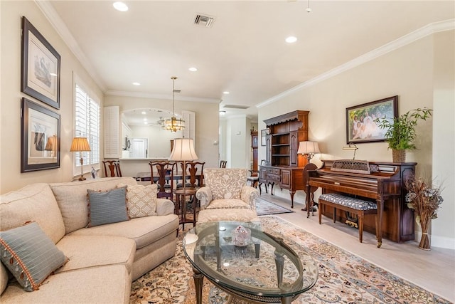 1135 Saint Georges Ln, Vero Beach, FL 32967 - living area with recessed lighting, a chandelier, and ornamental molding