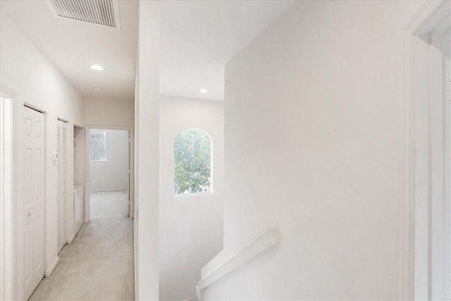 2597 Stockbridge Sq SW Unit 2597, Vero Beach, FL 32962 - corridor with recessed lighting and light carpet