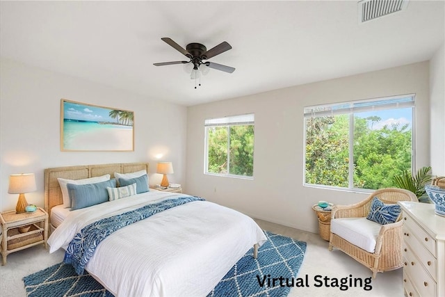 2597 Stockbridge Sq SW Unit 2597, Vero Beach, FL 32962 - bedroom with light colored carpet and ceiling fan