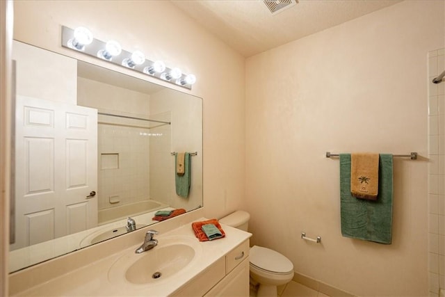 2597 Stockbridge Sq SW Unit 2597, Vero Beach, FL 32962 - bathroom with vanity, toilet, shower / washtub combination, and tile patterned floors