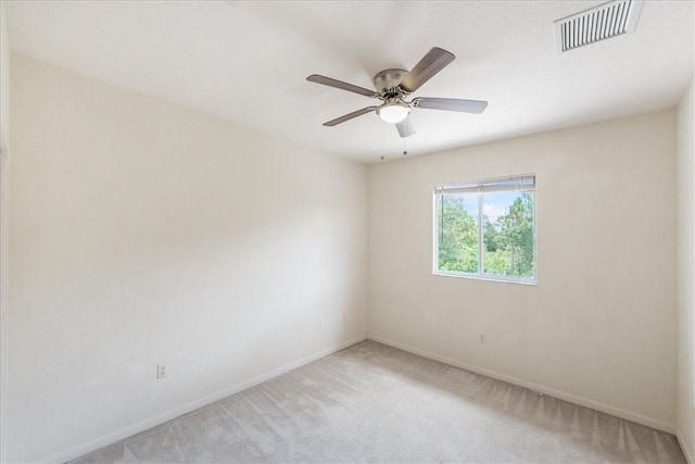2597 Stockbridge Sq SW Unit 2597, Vero Beach, FL 32962 - unfurnished room with light carpet, baseboards, and a ceiling fan