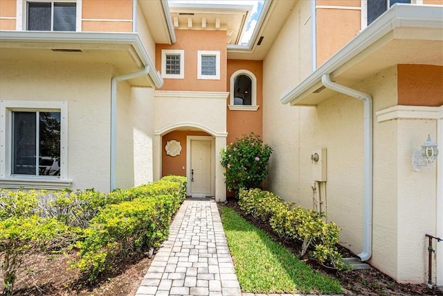 2597 Stockbridge Sq SW Unit 2597, Vero Beach, FL 32962 - entrance to property featuring stucco siding