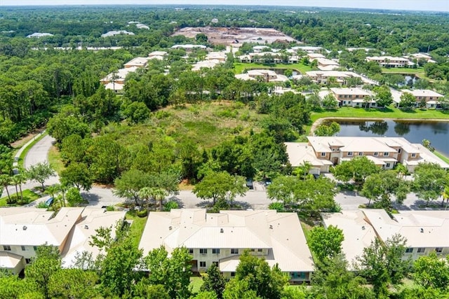 2597 Stockbridge Sq SW Unit 2597, Vero Beach, FL 32962 - aerial perspective of suburban area featuring a nearby body of water