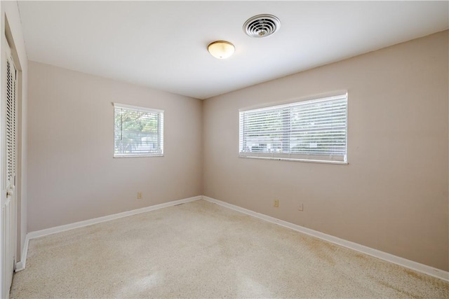 1936 5th Ave, Vero Beach, FL 32960 - spare room with baseboards