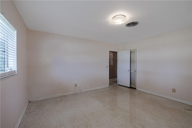 1936 5th Ave, Vero Beach, FL 32960 - unfurnished room featuring baseboards