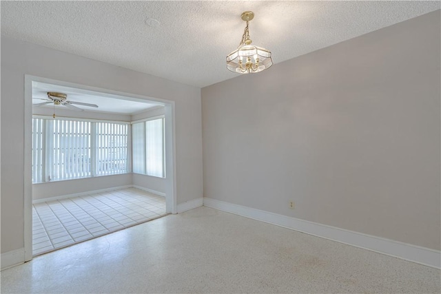 1936 5th Ave, Vero Beach, FL 32960 - unfurnished room with a chandelier, a textured ceiling, and a ceiling fan