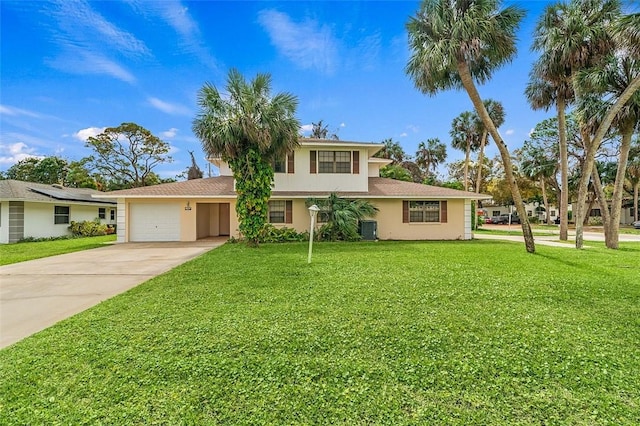 view of front of property featuring cooling unit, a garage, and a front yard