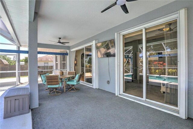 537 Ray St, Sebastian, FL 32958 - sunroom featuring a ceiling fan and outdoor dining space