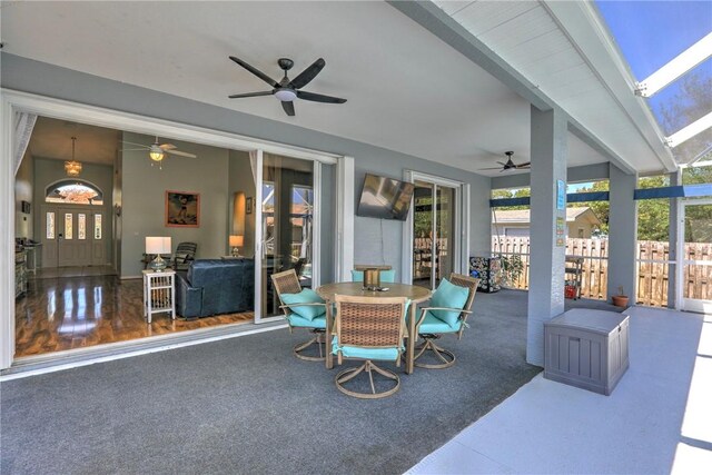 537 Ray St, Sebastian, FL 32958 - view of patio / terrace featuring outdoor dining area, a ceiling fan, and fence