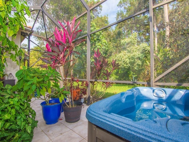 unfurnished sunroom featuring a hot tub