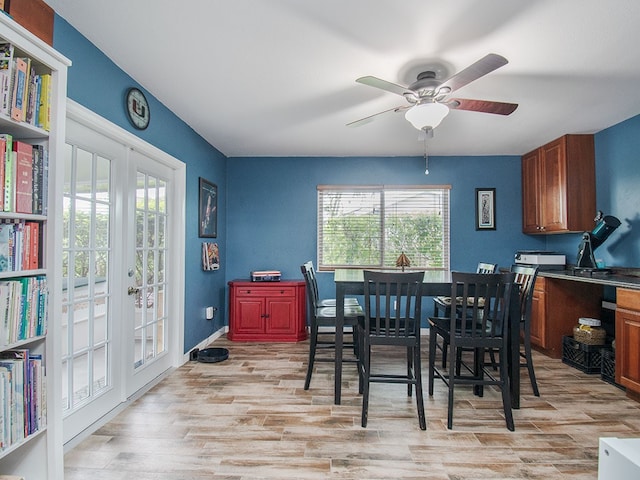 624 24th St SW, Vero Beach, FL 32962 - dining room with french doors, light wood-style floors, and ceiling fan