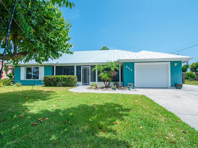 624 24th St SW, Vero Beach, FL 32962 - ranch-style home featuring an attached garage, concrete driveway, a front yard, and stucco siding
