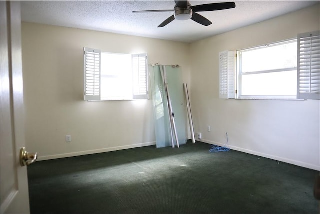 755 39th Ave, Vero Beach, FL 32968 - empty room featuring ceiling fan, carpet flooring, baseboards, and a textured ceiling
