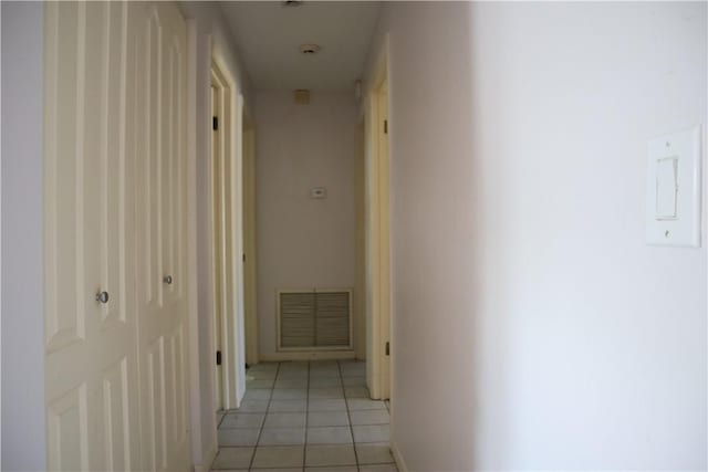 755 39th Ave, Vero Beach, FL 32968 - corridor with light tile patterned floors and baseboards