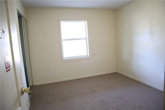 755 39th Ave, Vero Beach, FL 32968 - unfurnished room featuring carpet and baseboards