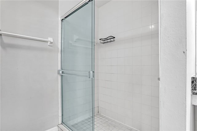 bathroom with an enclosed shower