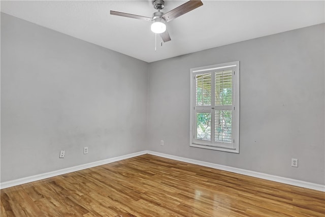 unfurnished room with light hardwood / wood-style flooring and ceiling fan