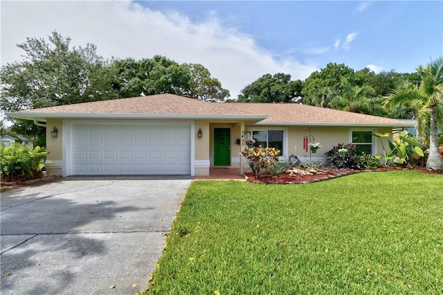 3405 Atlantic Blvd, Vero Beach, FL 32960 - ranch-style house with stucco siding, concrete driveway, a front yard, and an attached garage