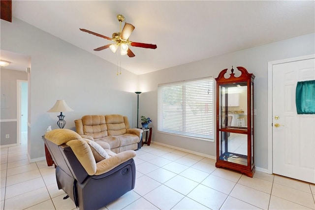 3405 Atlantic Blvd, Vero Beach, FL 32960 - living room featuring vaulted ceiling, a ceiling fan, light tile patterned flooring, and baseboards