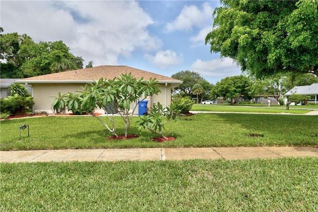 3405 Atlantic Blvd, Vero Beach, FL 32960 - view of front of home with a front yard and stucco siding