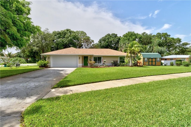 3405 Atlantic Blvd, Vero Beach, FL 32960 - ranch-style house featuring a garage, a front yard, driveway, and view of scattered trees