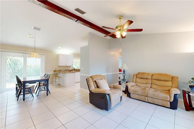 3405 Atlantic Blvd, Vero Beach, FL 32960 - living area featuring light tile patterned floors and a ceiling fan