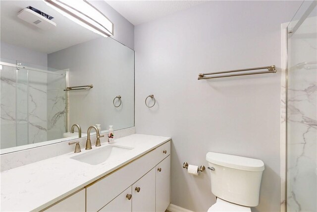 3405 Atlantic Blvd, Vero Beach, FL 32960 - full bath with vanity, a marble finish shower, and toilet