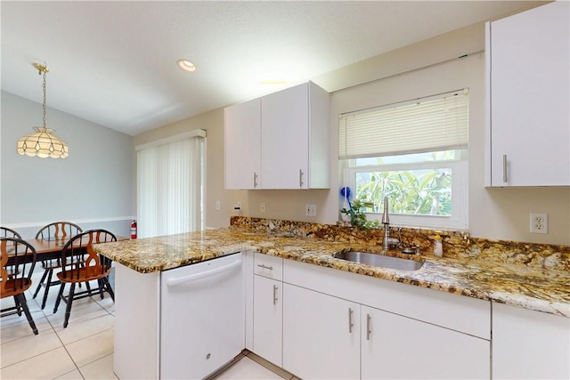 3405 Atlantic Blvd, Vero Beach, FL 32960 - kitchen featuring white dishwasher, a sink, a peninsula, light stone counters, and recessed lighting