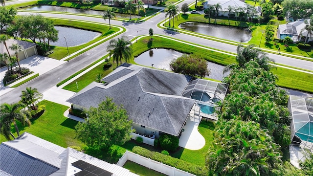 birds eye view of property featuring a water view