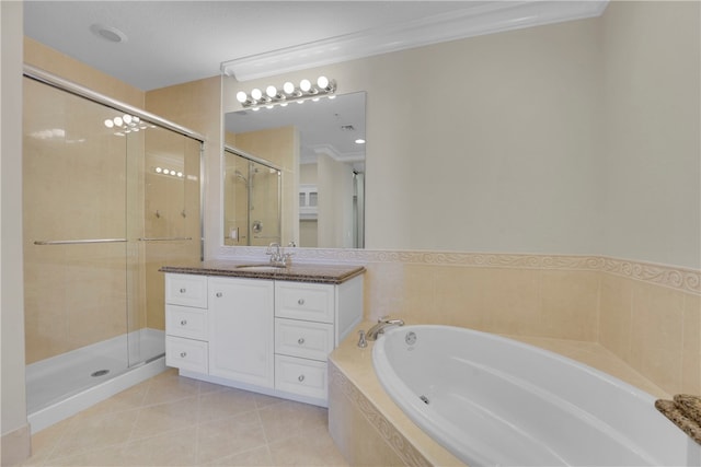 bathroom with vanity, tile patterned flooring, plus walk in shower, and ornamental molding