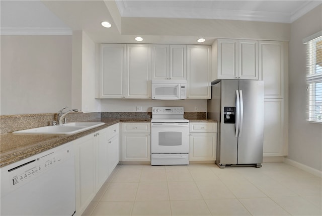 kitchen featuring stone countertops, sink, ornamental molding, white appliances, and white cabinets