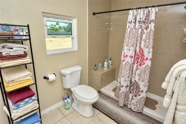 bathroom with tile patterned flooring, toilet, and a shower with shower curtain