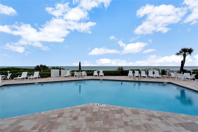 202 N Carmel Ct, Vero Beach, FL 32963 - community pool featuring fence, a water view, and a patio