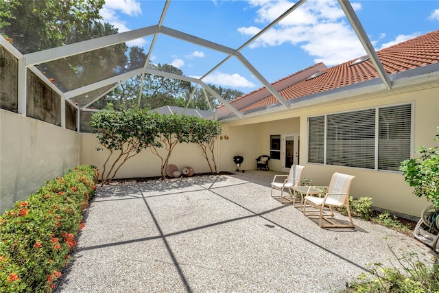 202 N Carmel Ct, Vero Beach, FL 32963 - view of patio featuring a lanai