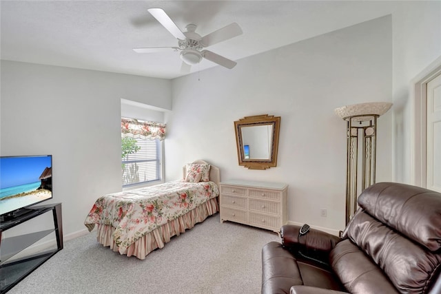 202 N Carmel Ct, Vero Beach, FL 32963 - bedroom with lofted ceiling, ceiling fan, light carpet, and baseboards
