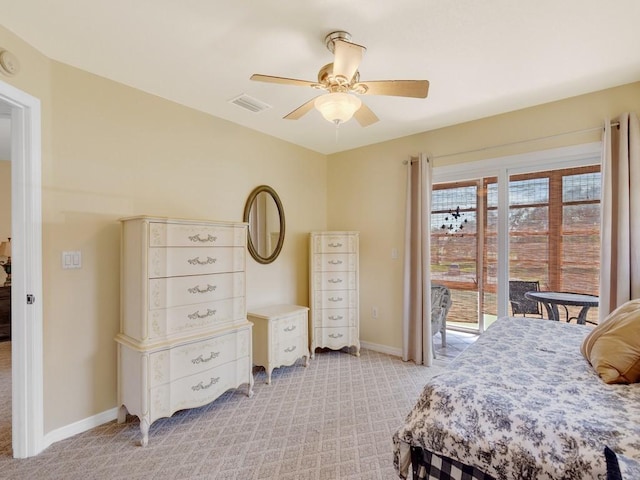 carpeted bedroom with access to outside and ceiling fan