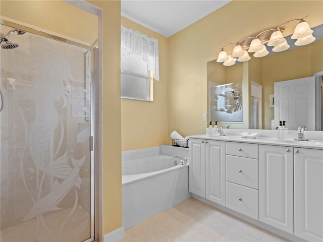 bathroom with vanity, tile patterned floors, and separate shower and tub