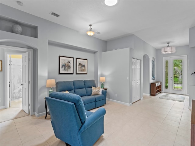 living room with light tile patterned floors