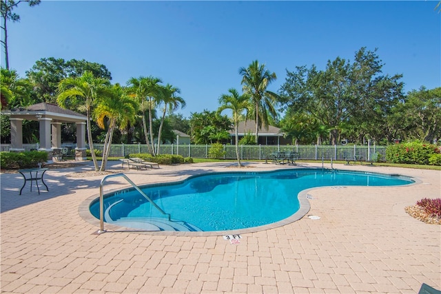 view of pool with a gazebo and a patio area