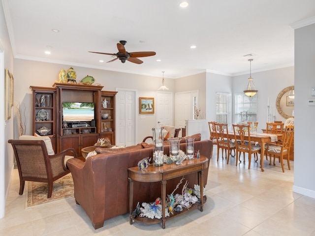 tiled living room featuring ceiling fan and ornamental molding