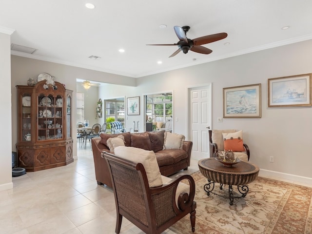 living room featuring ceiling fan and ornamental molding