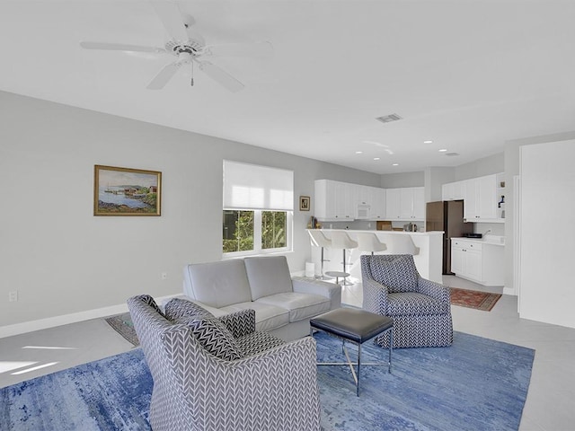 5235 W Harbor Village Dr, Vero Beach, FL 32967 - living area with light tile patterned floors, a ceiling fan, baseboards, visible vents, and recessed lighting