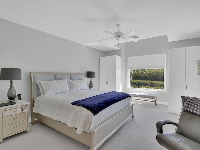 5235 W Harbor Village Dr, Vero Beach, FL 32967 - bedroom featuring visible vents, light carpet, and a ceiling fan