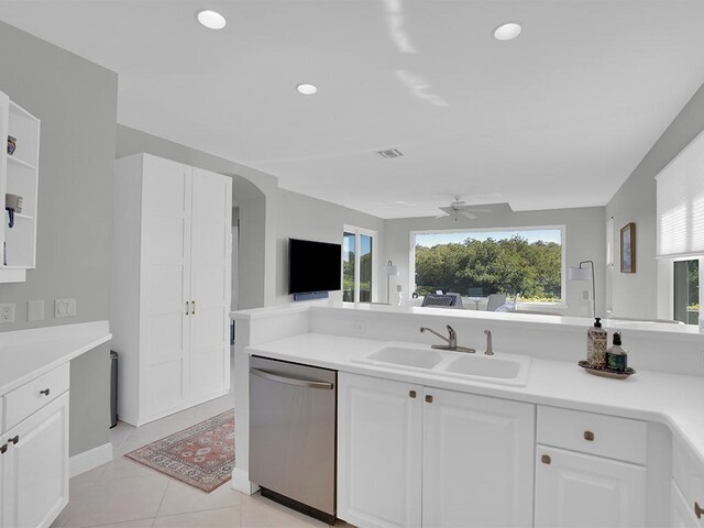 5235 W Harbor Village Dr, Vero Beach, FL 32967 - kitchen featuring white cabinets, dishwasher, ceiling fan, and a sink