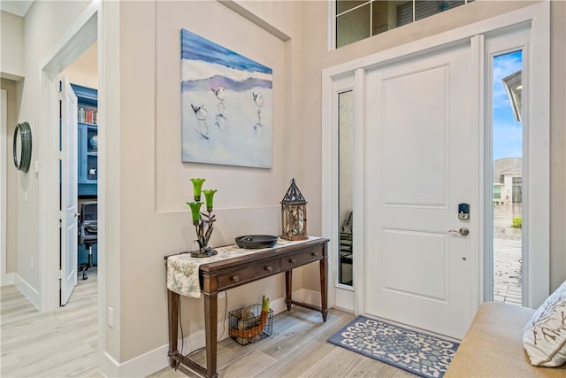 entrance foyer with light wood-type flooring