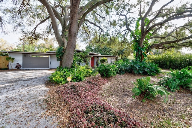 ranch-style house featuring a garage